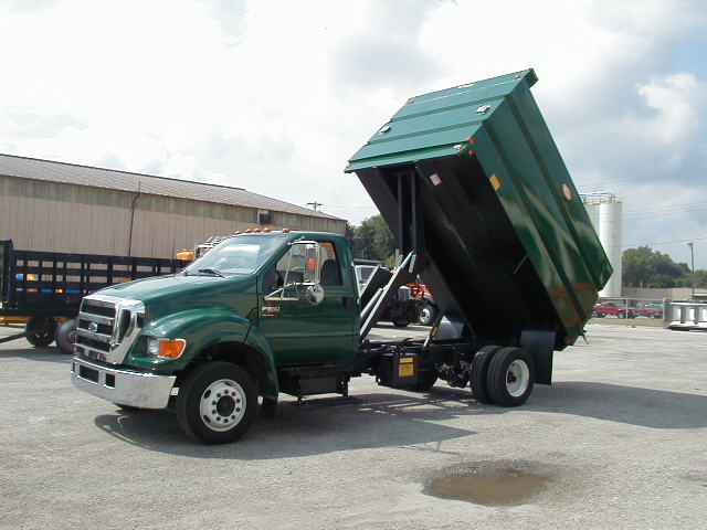 Concord Road Equipment Green Truck With Green Dump Bed Raised