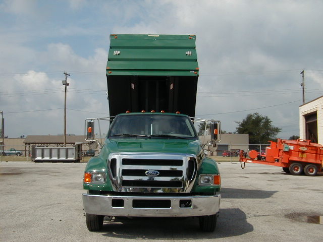 Concord Road Equipment Green Truck With Dump Bed Raised Front